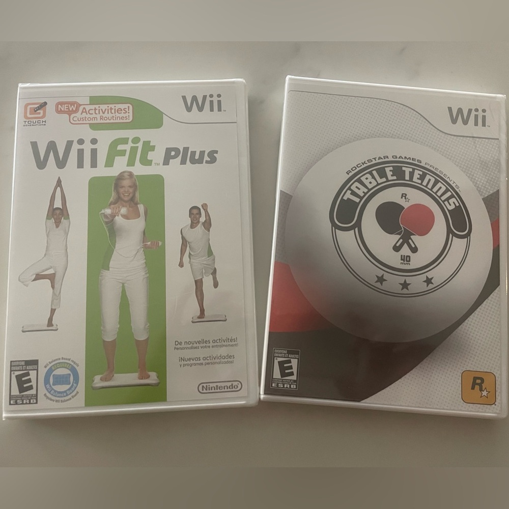 Unopened Nintendo Wii Fit Plus and Table Tennis games
